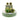 Two avocado-shaped toy wands for pets, displayed on a light green circular pedestal with a white block behind them. The toys feature a green outer shell, a beige inner flesh texture, and a dark gray seed.