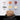 Assorted animal protein sources including chicken, salmon, chicken liver, whole sardine, chicken bone broth, and fish bone broth on a gray background, Pet Essentials Warehouse